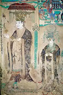 Portrait of Khotanese King Viśa' Saṃbhava and his queen consort Cao Yijin in the Mogao Caves, c. 10th century