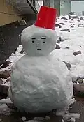 Japanese snowman (yukidaruma) with 2 parts and a bucket hat.