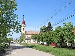 Road of Zădăreni with the Greek Catholic church, erected in 1777[2]