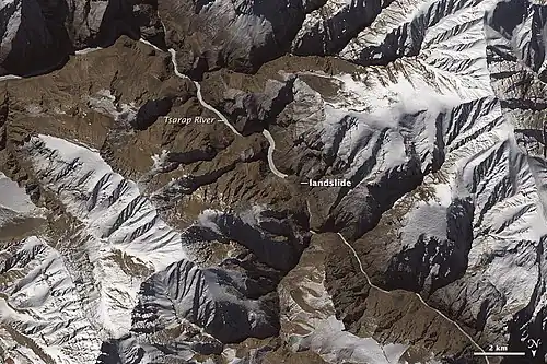 Satellite image of the Tsarap River in January 2015 showing the landslide and lake building up. In addition, the river is frozen and is covered in snow
