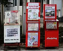 In Munich, Germany, the dispensers for the three local tabloids (depicted) have only transparent plastic lids on top which can be readily opened without inserting a coin - which is, however, demanded. Hence, the sellers have a significant amount of trust in people.