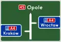 E-1b "pre-signpost board, before the motorway entrance"