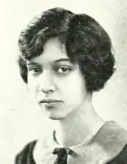 A young Black woman, from a yearbook photo
