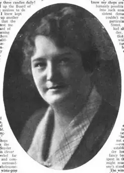 A white woman in an oval frame