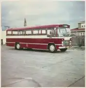 Colour image of Morris 702 bus