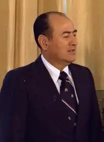 A photograph of Carlos Humberto Romero wearing a suit