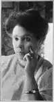 Maria P. Williams (1866–1932) was a teacher, reporter, actor and screenwriter, but she is also credited as the first Black woman film producer for the five-reel silent crime drama based on her own screenplay, Flames of Wrath in 1923.[70]