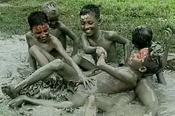 Boys playing in the mud in Bangladesh, 2008