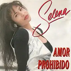 The cover image shows Selena wearing a black spandex underneath a golden-plain shirt, while she tilts her head towards the viewer of the picture and posing; titled with the singer's name and song.