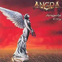 An angel statue in a wheat field under a red sky