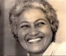Black and white portrait of Argalia Laya grinning