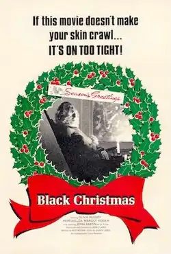 An image of a dead young woman on a rocking chair with a clear plastic bag over her head is seen in the center of a Christmas wreath.