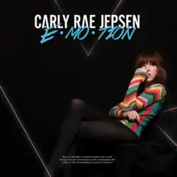 Jepsen sitting with her legs crossed