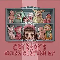 The cover artwork of Melanie Martinez's 2016 extended play Cry Baby's Extra Clutter EP, showing illustrated doll-like and stuffed animal characters arranged on shelves above the title written in pink lettering.