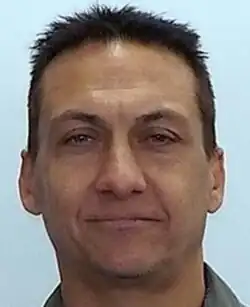 A caucasian middle-aged man