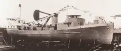 A close-up photo of the hulk of an individual ship