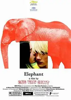 Poster with an orange elephant silhouette and a small photo of two teenagers close together, one kissing the other's cheek