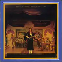 framed scene of lone female country guitarist-singer in front of gamblers and women in western saloon
