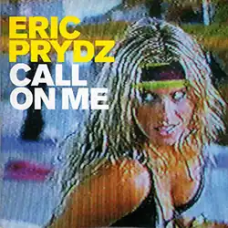 A still image of a showing a female fitness trainer in an 1980's aerobics outfit performing a gym routine in front of a mirror, where other dancers are also following along. The image is taken out a CRT monitor, with text (not part of the main image) in Yellow for the artist's name, and in white for the song's title.