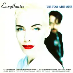A close up image of Annie looking at the viewer, with David seen behind her in a blurred background. On the bottom, the list of songs that are part of the album are written.