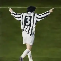 A painting of a football player with his arms outstretched