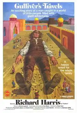 A colorful illustrated movie poster for Gulliver's Travels shows the giant Gulliver tied to the ground by tiny people in a walled city.