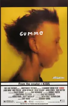 A semi-blurry picture of a young boy's side profile with messy hair.