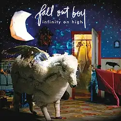 A photo of a winged sheep, standing still in a blue bedroom, with the moon and stars in the background. The band's name and the album's title can be seen written in white.