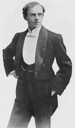 middle-aged, clean-shaven white man in evening costume