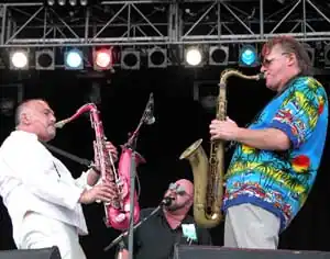 Jo Jo Zep and the Falcons performing at the Melbourne International Music and Blues Festival in February 2004 Left to right: Joe Camilleri, John Power and Wilbur Wilde