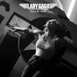 The black-and-white artwork shows Lady Gaga, wearing a white tank top, posing in front of an aircraft bearing the letters "LG". Her name and the song title, "Hold My Hand", appear in white text at the top center of the image.