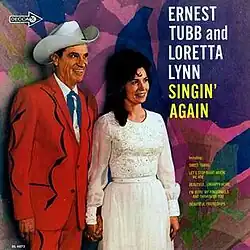 photo of Ernest Tubb in red and Loretta Lynn in white