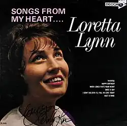 album cover photo of Loretta Lynn looking up smiling