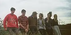 Love Migrate at the time of their release of their first album: Plagued Are All My Thoughts, Like White Ants In The Fence