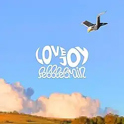 A pixelated image of the sky, with clouds emerging from behind a hill. In the centre is the band logo and the name of the record. In the top is a poorly-rendered flying seagull.
