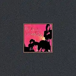 A saturated red image of four people surrounded by a grey border. Text inside the image reads "My Bloody Valentine Ecstasy".