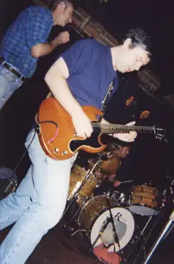 Weber performing with Seminal Rats, 1998