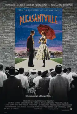 The theatrical release poster shows people in black and white color looking at a color poster that is placed at the wall. The poster shows a teenage boy standing next to a teenage girl holding an umbrella behind a colorful scene of a town. The tagline reads "Nothing is as simple as Black and White".