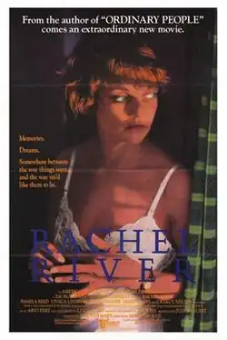 Movie poster with large blue title text over a woman in white brassière gazing sideways in shadowed light