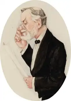 white man in late middle age with thinning white hair and a neat moustache and beard