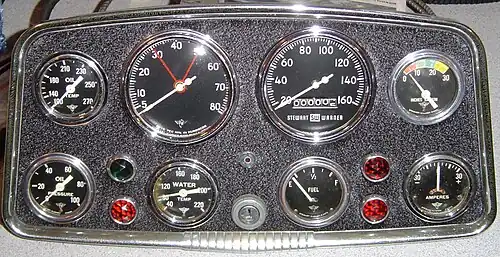 Mid-1950s Stewart-Warner automotive instruments in "Hollywood" panel