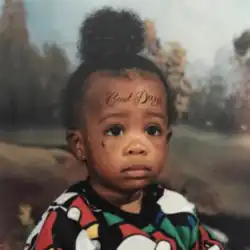 SZA as a kid with a tattoo wrote on it "Good Days"