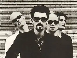 Shudder to Think in 1996. L–R: Craig Wedren, Nathan Larson, Kevin March, and Stuart Hill