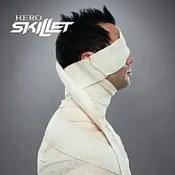 A man in profile wrapped in white bandages, with the words "Hero Skillet" in white text above.