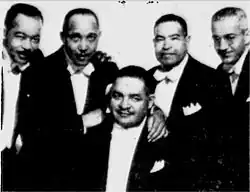 Ray Yeates (tenor, far left), Lowell Peters (second tenor), Jay Stone Toney (baritone), William W. Edmunson (bass, center), and Spencer Odom (accompanist/arranger, far right).