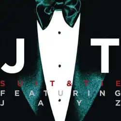 Cover art for "Suit & Tie": A close-up of a black tuxedo and bow tie, overlaid with large white letters "J" and "T" on the left and right, respectively. Below them, the title "SUIT & TIE" appears in red, and the words "FEATURING JAY Z" appear in gray.