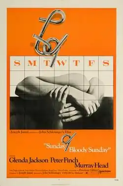 Movie poster with a calendar grid, a black-and-white photo of intertwined arms and hands in the middle, and bold orange sections with the title and credits below.