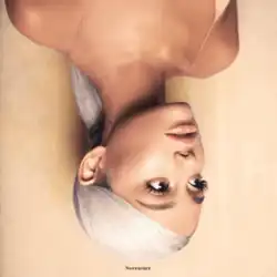 A portrait of Ariana Grande in platinum blonde hair, shown upside down. Looking to the right side of the image, she wears a sleeveless shirt and a nude lipstick, the latter of which matching the color of the background and the shirt. At the bottom of the cover art, small text that reads "Sweetener" is displayed in black.