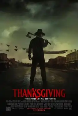 A masked man wearing a pilgrim costume and wielding an axe stands in front of an empty town road. The tagline below the film's title reads "There will be no leftovers".