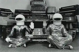 The Moog Cookbook posing in front of various synthesizers and keyboards, circa 1996. From left: Meco Eno and Uli Nomi.